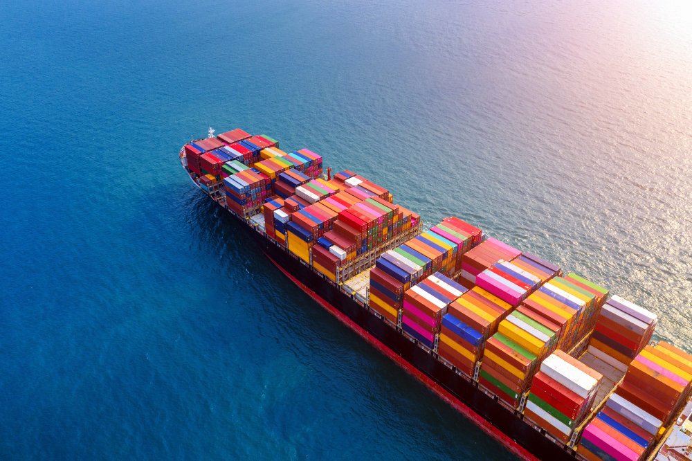 Container ship transporting cargo by sea